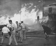 Firefighters at lumber yard fire