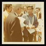 Cesar Chavez standing in group