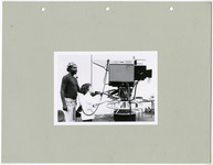 KUHT camera operator with child behind the camera