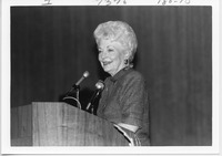 Ann Richards standing at a podium
