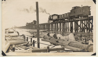 Three trains crossing the temporary trestle