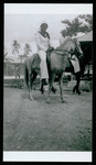 Crew members on horses