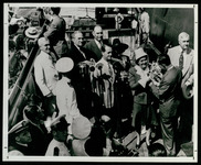 Mrs. Claud B. Hamill christens the USS Houston (CL-81) at launching ceremony