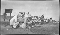 Sailors shooting rifles