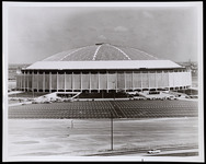 Exterior view of the Astrodome and parking lot