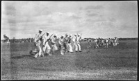 Sailors with rifles running in a drill
