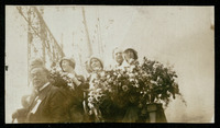 Mary Ellen Bute (maid of honor), Elisabeth Holcombe (ship's sponsor), and Charlotte Williams (special guest) on platform at USS Houston (CA-30) launching ceremony
