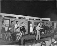 Students perform on stage