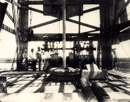 Wildcatters on a drilling derrick deck
