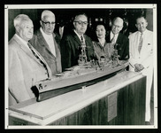 Model presentation, USS Houston (CA-30), from 3rd from right, Elisabeth Holcombe Crosswell, A.D. Simpson, William A. Bernrieder
