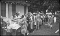 Group of people in line for food