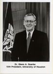 Glenn A. Goerke by a University of Houston flag