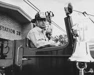 Station 28 Captain with mascot Domino