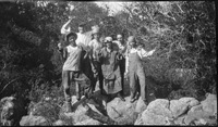 Group of people standing on rocks