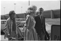 Dick Cavett and wife, Carrie Nye, walking