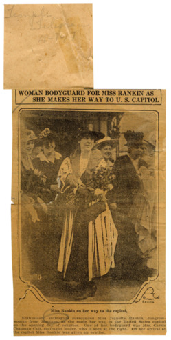 Woman Bodyguard For Miss Rankin As She Makes Her Way To U. S. Capitol