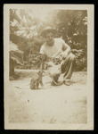 Crew member with monkey to his right