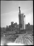Group of men at oil well