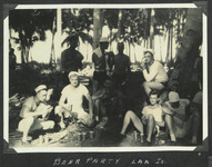 A group of Navy sailors at a party
