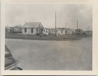 Corner view of damaged houses