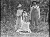 Man and boy with dog