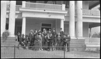 Group of people on the steps of a building