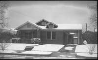 Snow covered house on on Bissonnet Street