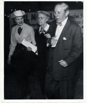 Hugh Roy and Lillie Cranz Cullen walking with a woman