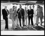 President Philip. G. Hoffman with a group of men breaking ground