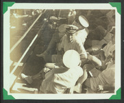 Officers sitting outside of the boxing ring