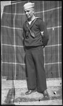 Man posing in sailor's uniform