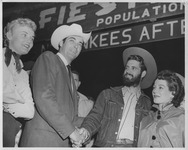 Handshake at Fiesta City gate