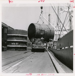 Ship loading freight onto deck