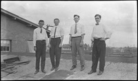 Group of men on a roof