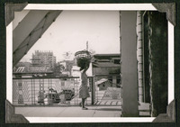 Woman crossing a bridge