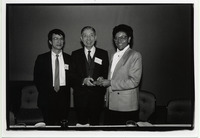 Paul Chu standing next to K.T. Li and President Ross Barnett