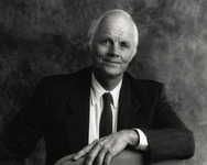 Roy H. Cullen with his hand draped over a chair