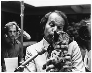 Shasta V being kissed by UH President Barry Munitz