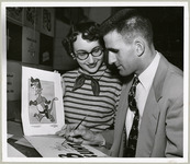 Nancy Watchouse and George Collins review a Walt Disney cougar cartoon