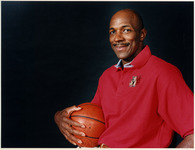 Clyde Drexler with a basketball