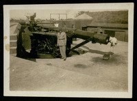 Crew member with large gun