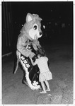 Cougar Mascot dancing with a little girl