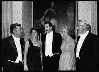 President Philip G. Hoffman and Mary Hoffman with three people in front of a painting