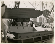 Vehicle being loaded onto ship