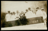 Elisabeth Holcombe (ship's sponsor) on platform at USS Houston (CA-30) launching ceremony