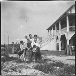 Group of people sitting on rock