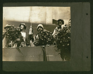 Mary Ellen Bute (maid of honor), Elisabeth Holcombe (ship's sponsor), and Charlotte Williams (special guest) on platform at USS Houston (CA-30) launching ceremony