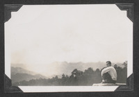 A man looking at the view from the top of Mines View Park