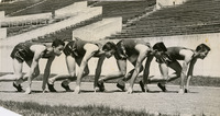 Runners in starting position for a track event
