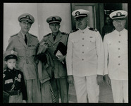 Rear Admiral William A. Glassford (far left)